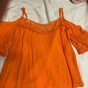 The brand is Love, Fire. It is flowly and great for summer.